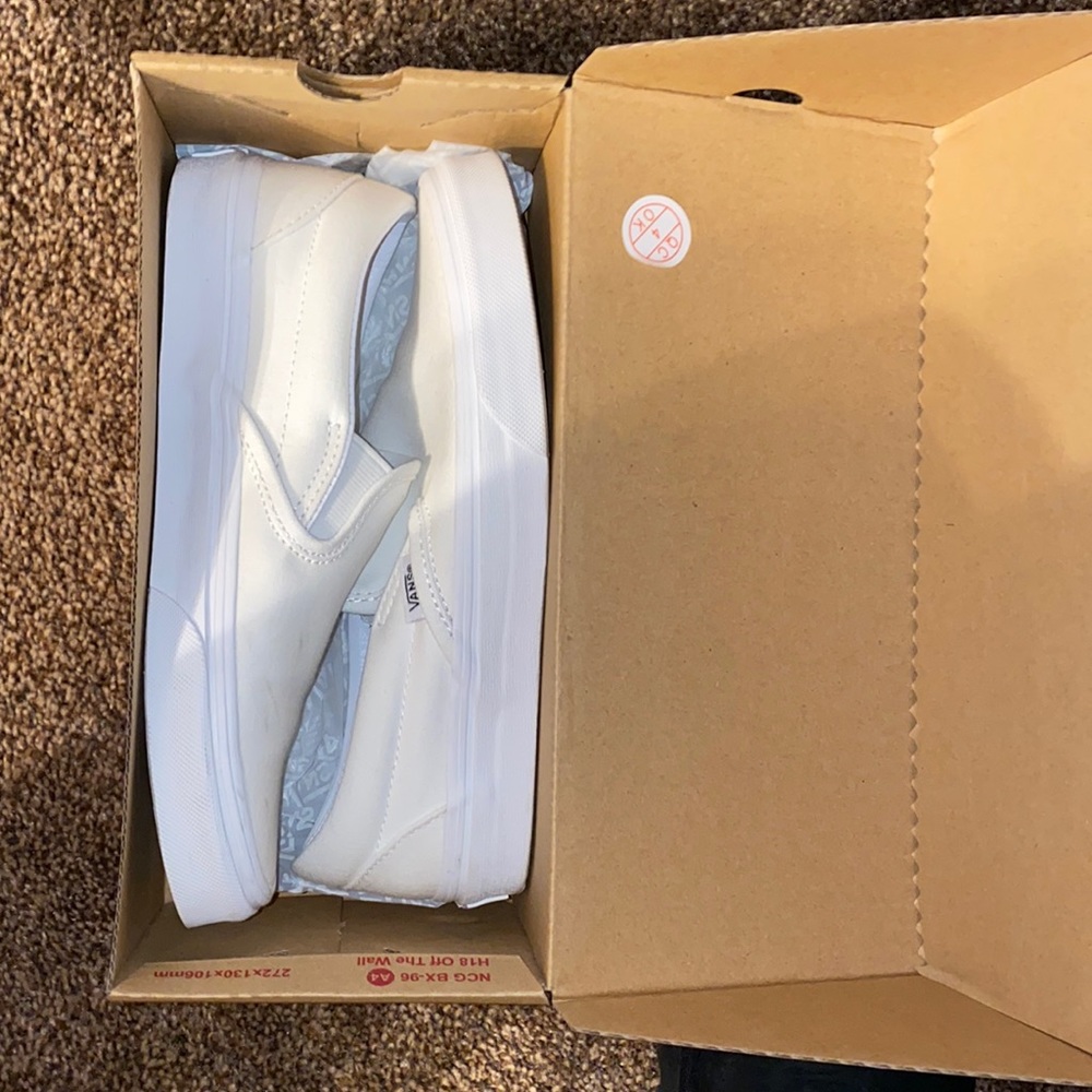 White slip on vans